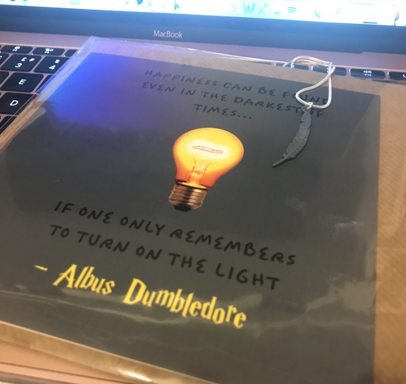 magic alley card and necklace